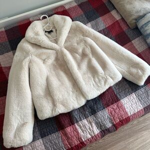 White faux fur coat